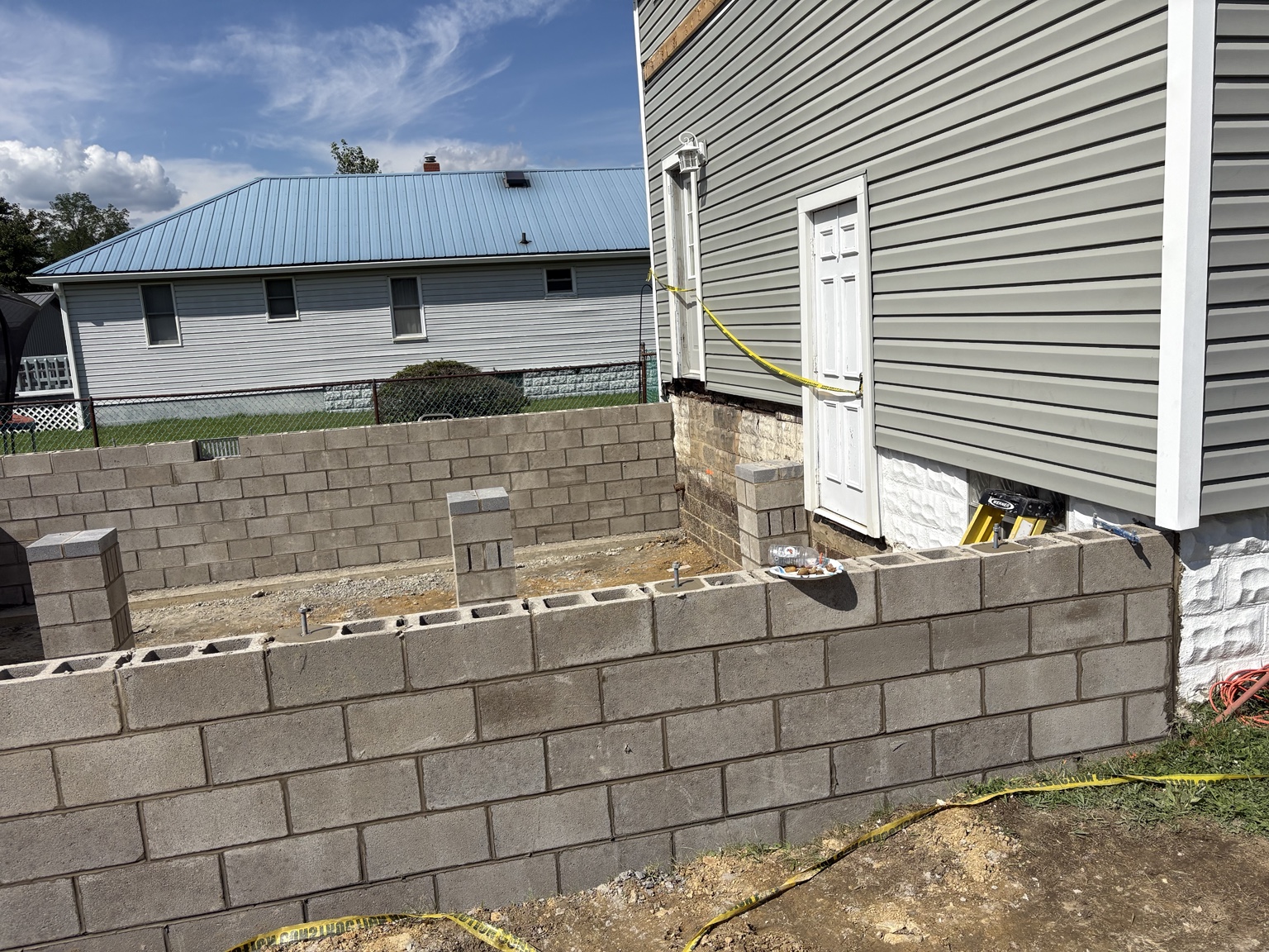 Block foundation walls under construction for a house addition